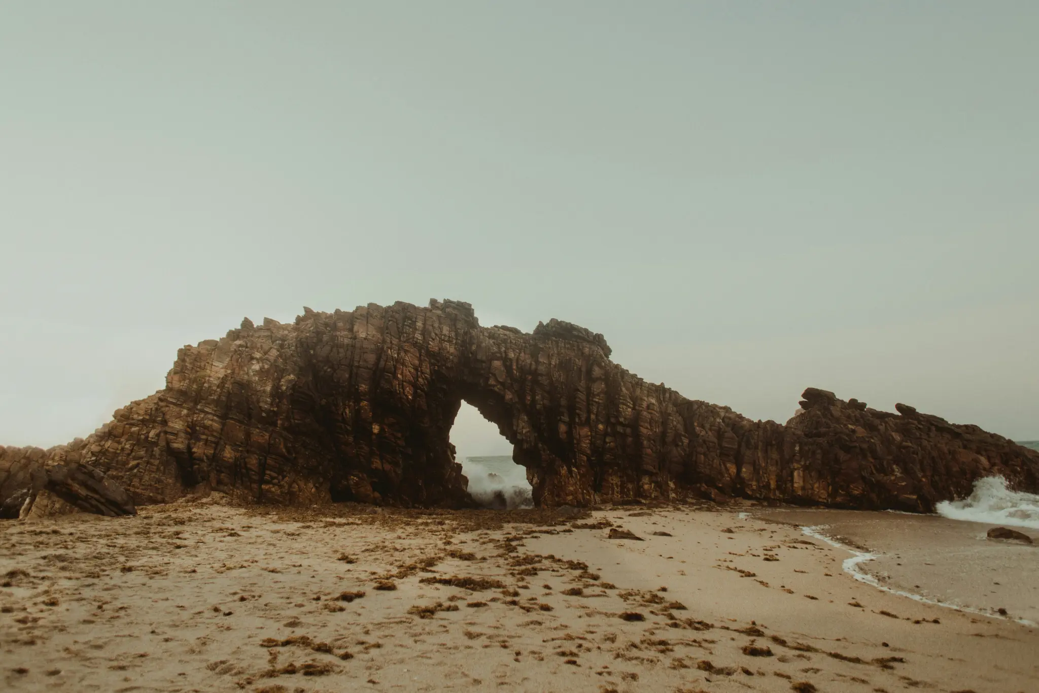 Natural rock arch on the coast of Ceará